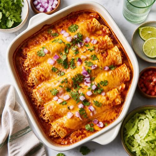Shredded chicken recipe - Cheesy Baked Chicken Enchiladas
