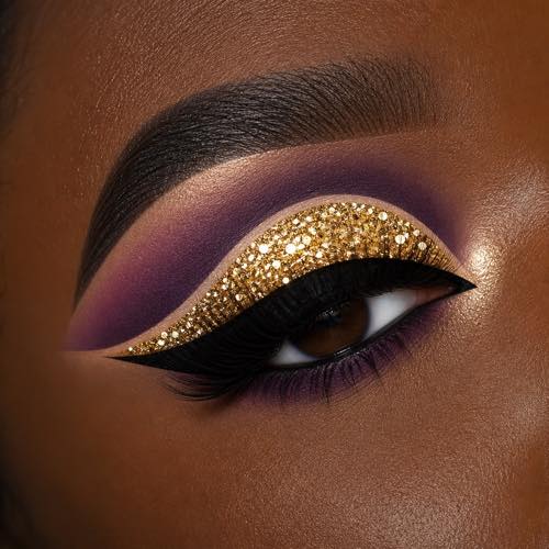 Mardi Gras makeup idea 2: Glistening Gold Glitter Cut Crease with purple, green, and gold carnival styling